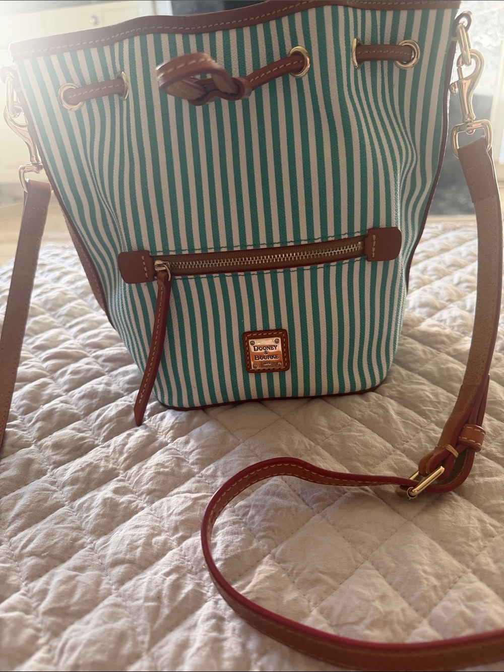 Dooney & Bourke Teal and White Striped Bucket Crossbody